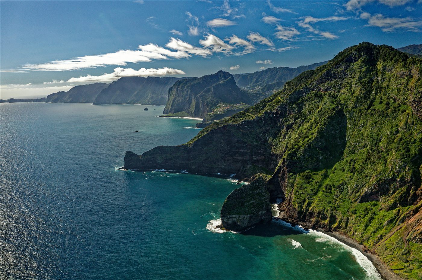 Green cliffs and Atlantic coastline in West Madeira